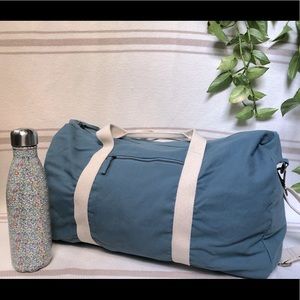 Medium sized Known Supply duffel bag